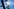 Ein schwarzes Thermometer vor blauem Sonnenhimmel