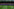Die Spieler zweier Mannschaften stehen sich am Mittelkreis eines Fussballfeldes gegenüber