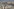 Menschen trägen Säcke mit Mehl auf den Schultern, sie gehen durch eine Trümmerlandschaft Menschen trägen Säcke mit Mehl auf den Schultern, sie gehen durch eine Trümmerlandschaft