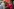 Bärbel Bas unterhält sich vor einem Wahlkampfstand der SPD mit einem Mann