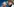 Joseph Blatter mit Sonnenhut und Franz Beckenbauer im Hintergrund