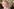Das Bild zeigt Julia Klöckner mit blonden Haaren, die zu einem Knoten zurückgebunden sind. Sie trägt Ohrringe und ein bunt gemustertes Oberteil in Pastellfarben, sie lächelt breit und schaut schräg nach oben.