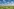 Flache Landschaft mit Wattewolkenhimmel