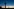 Ein hoher Turm mit der Leuchtschrift Mediaset an der Kuppel steht in der Abenddämerung und überragt die Stadt Ein hoher Turm mit der Leuchtschrift Mediaset an der Kuppel steht in der Abenddämerung und überragt die Stadt