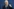 Mahmud Abbas vor blauem Hintergrund. Er macht eine Geste mit seiner linken Hand