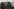 Taliban-Kämpfer fahren während Feierlichkeiten auf dem Dach eines Humvees mit.