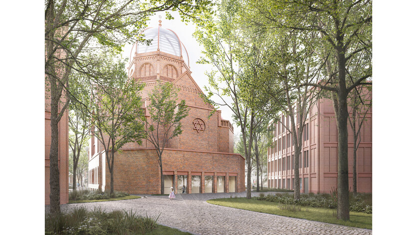 Synagogen-Zentralbau mit Backsteinfassaden und Glaskuppen, im Vordergrund ein zweistöckiges Nebengebäude