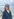 Ein Portraitfoto der Regisseurin am Strand