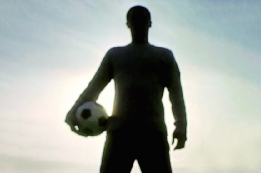 Silhouette eines Fußballers
