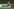 Werbebande beim Amateurfußball mit dem Banner der "Fußball-Woche", daneben ein Banner des BFC Dynamo