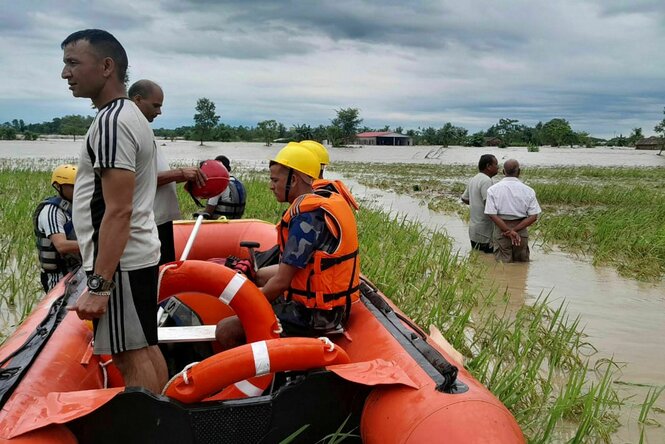 Nepalese army personnel get ready to rescue survivors after a flood in Jhapa district east of Nepal, Sunday, Oct. 5, 2025.