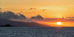 Ein Sonnenuntergang an einer Küstenlandschaft