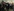 Juliane Nagel steht in einer gruppe von Demonstrierenden und spricht mit ihnen