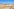 Eine Planierraupe an einem Strand