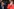 Bundeskanzlerin Angela Merkel (CDU) hält sich am 10.10.2017 während der Eröffnungsfeier der Buchmesse in Frankfurt am Main (Hessen) neben Frankreichs Staatspräsident Emmanuel Macron die Hand vors Gesicht.