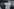 Teilnemerinnen und Teilnehmer einer Demonstration gegen den Landesparteitag der AfD Schleswig-Holstein 2025 halten ein Banner mit der Aufschrift "Das Hinterland nicht den Nazis überlassen - AfD und Co zerschlagen!".