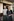 Schuster und Schusterin vorm Laden