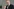 Karsten Wildberger (CDU), Bundesminister für Digitalisierung und Staatsmodernisierung. Er trägt einen dunklen Anzug, ein helles Hemd und eine dunkle Krawatte. Seine rechte Hand hält er, leicht zur Faust geballt, etwa auf Brusthöhe.