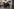 Burschenschafter in Uniform stehen beieinander