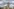düstere Wolken hinter dem Betongerippe des Elbtowers mit Kränen