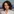 Portraitbild von Julia Brailovskaia, in weißem Hemd, schaut im Kamera