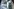 Geöffneter Kühlschrank mit Blick ins Innere - Milch und Saft im Getränkefach, Eier obn, Milchprodukte in der Mitte