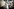 Schülerinnen stehen mit gebastelten Wolfsmasken in dem Flur ihrer Schule