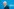 Kai Wegner vor einem blauen Hintergrund