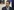 Juan Orlando Hernandez mit Brille und kurzgeschnittenen Haaren, Anzug und Krawatte bei einer Rede, vor ihm das Mikrofon eines Rednerpults.