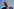 Porträt von Donald Trump vor blauem Himmel