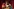 Handpuppen der Muppet Show mit Gaststar Rita Moreno in der Mitte vor rotem Vorhang