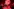 Magdalena Andersson betritt die Bühne, die mit einer stilisierten roten Nelke geschmückt ist