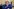 Der russische Oligarch Alischer Usmanow trägt einen blauen Anzug,rote Krawatte, eine Brilla, hat wenig Haare und dicke Backen