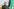 Ibrahim Ibrahim steht vor einer palästinensischen Flagge