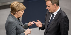 Angela Merkel und Thomas Oppermann.