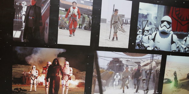 Fotos an einer Wand zeigen Figuren aus Star Wars