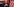 Donald Trump in Boxerpose neben der amerikanischen Flagge