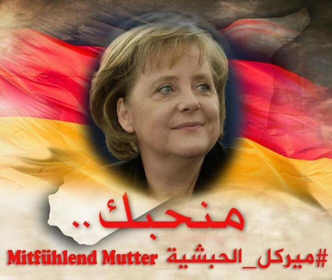 Arabisches Plakat mit Bundskanzlerin Angela Merkel.